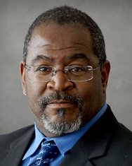 A headshot photo featuring John Porter, MD, assistant dean for clinical affairs at CMSRU.