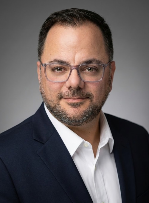 A headshot photo featuring Anthony J. Mazzarelli, MD, JD, MBE, associate dean for clinical affairs at CMSRU.