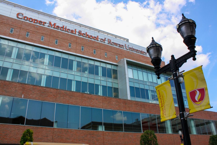 A photo featuring the street view of the exterior of the CMSRU Medical Education Building.