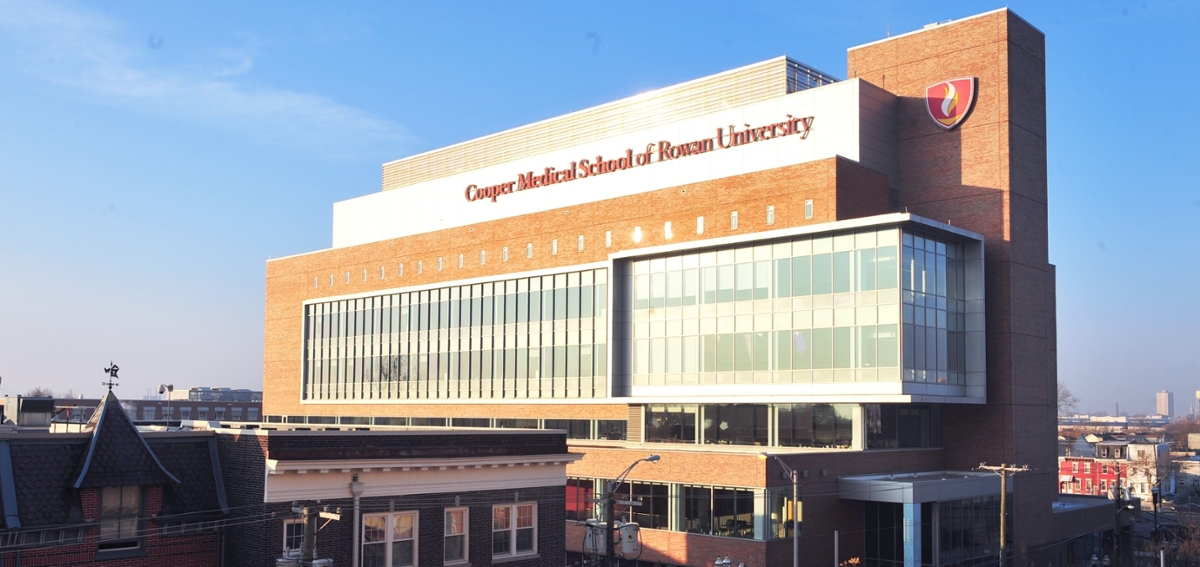 A photo of the sun shining on the exterior of the CMSRU Medical Education Building.