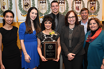 Sangita Phadtare, PhD, associate professor of biomedical sciences at CMSRU is shown with an award. Dr. Phadtare was recently honored during the Annual Celebrating Excellence Awards ceremony at Rowan University's main campus in Glassboro, NJ.