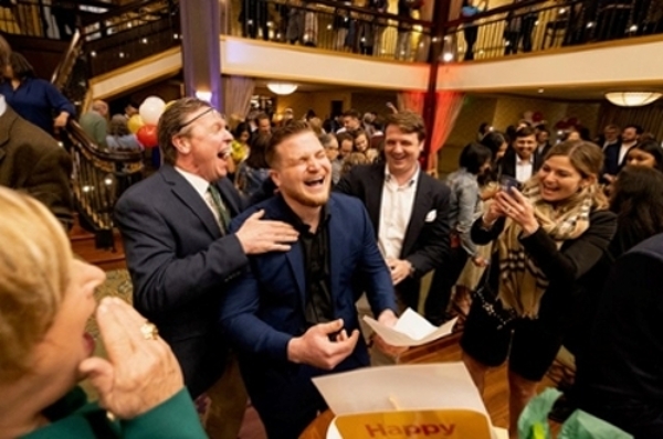 This is an image of a student celebrating his residency match at the Match Day event.