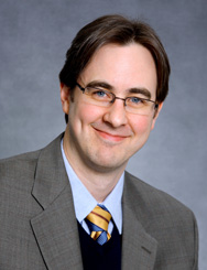 A headshot of John Robertson