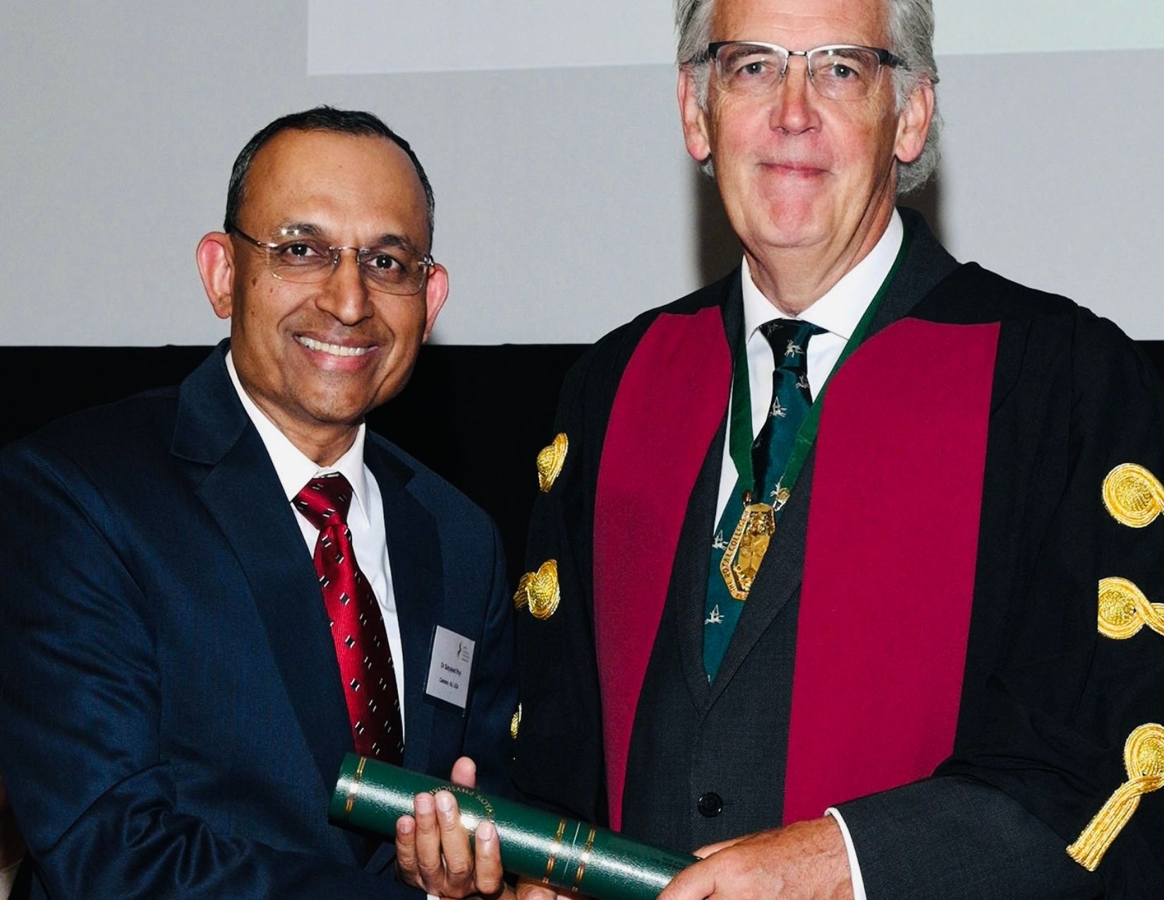 Dr. Roy accepting.