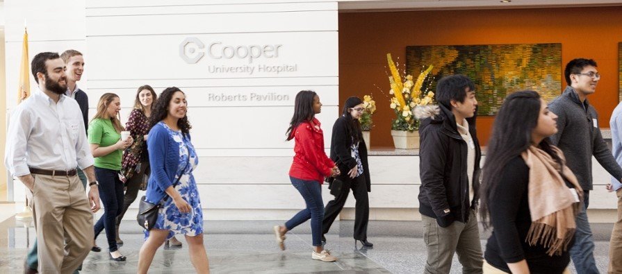 A photo featuring a group of individuals on a tour on Cooper University Health Care's Health Sciences Campus.