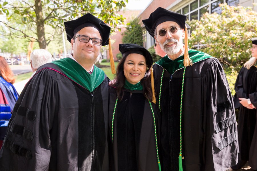CMSRU faculty members pose for a photo at a CMSRU Commencement ceremony.