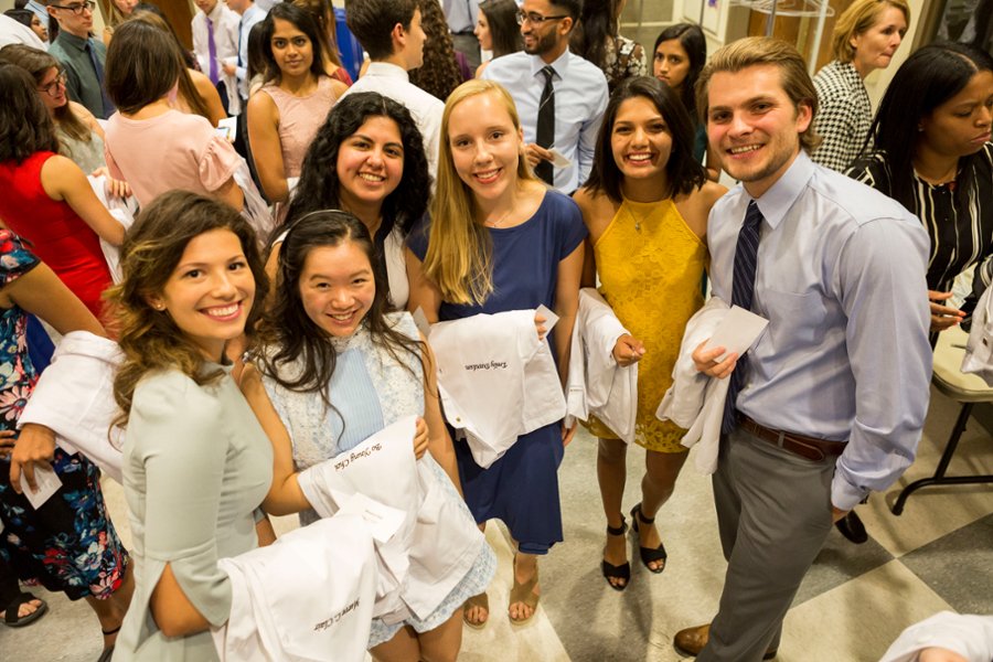 A group of CMSRU students pose at the White Coat Ceremony.