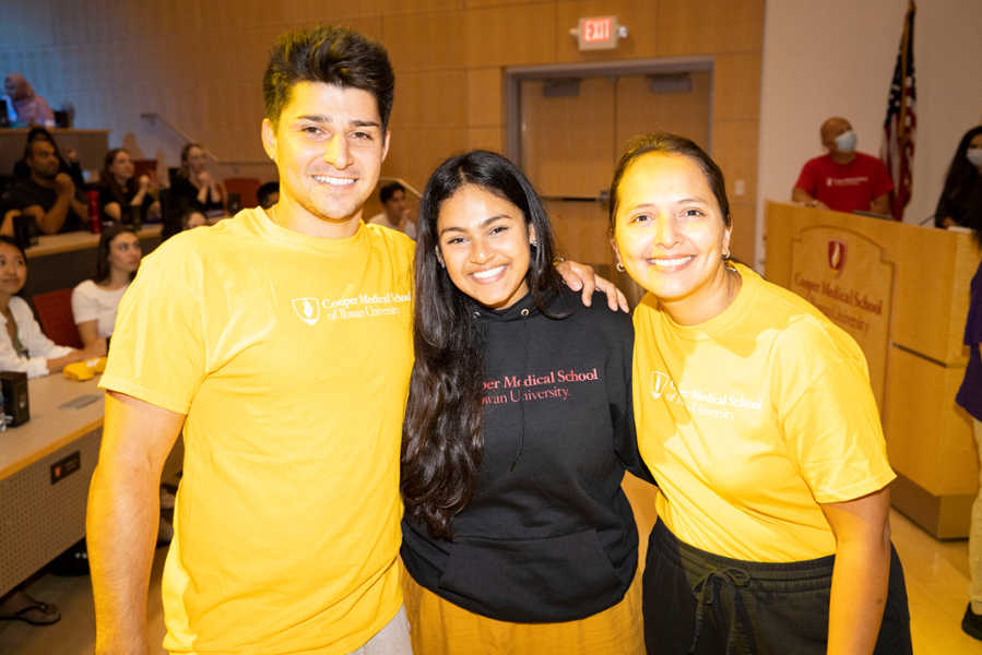 CMSRU students pose with a faculty member at the Advisory College Sorting Ceremony.