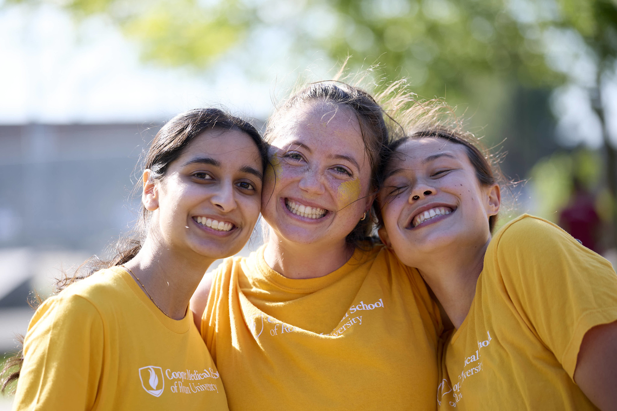 A group of CMSRU students and faculty members are featured working on community service.